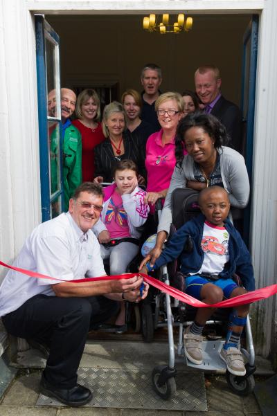 Paul Bates opens the new dining room at Children's Trust, Tadworth